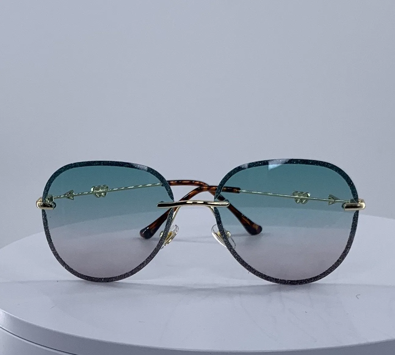 Embellished oversized green and gold pilot sunglasses