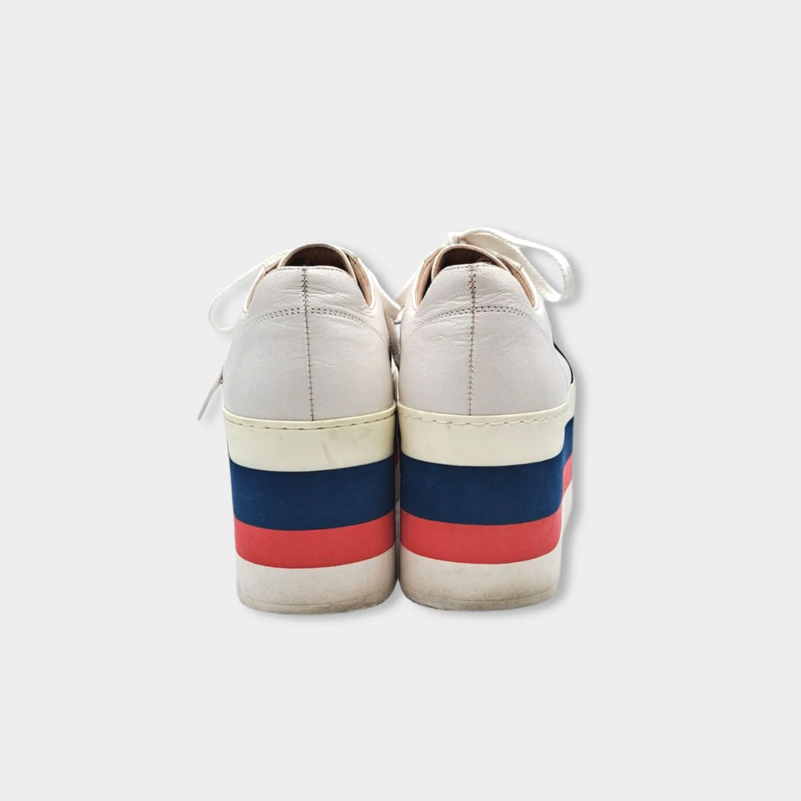 Gucci women's white leather platformed sneakers with red and navy accents
