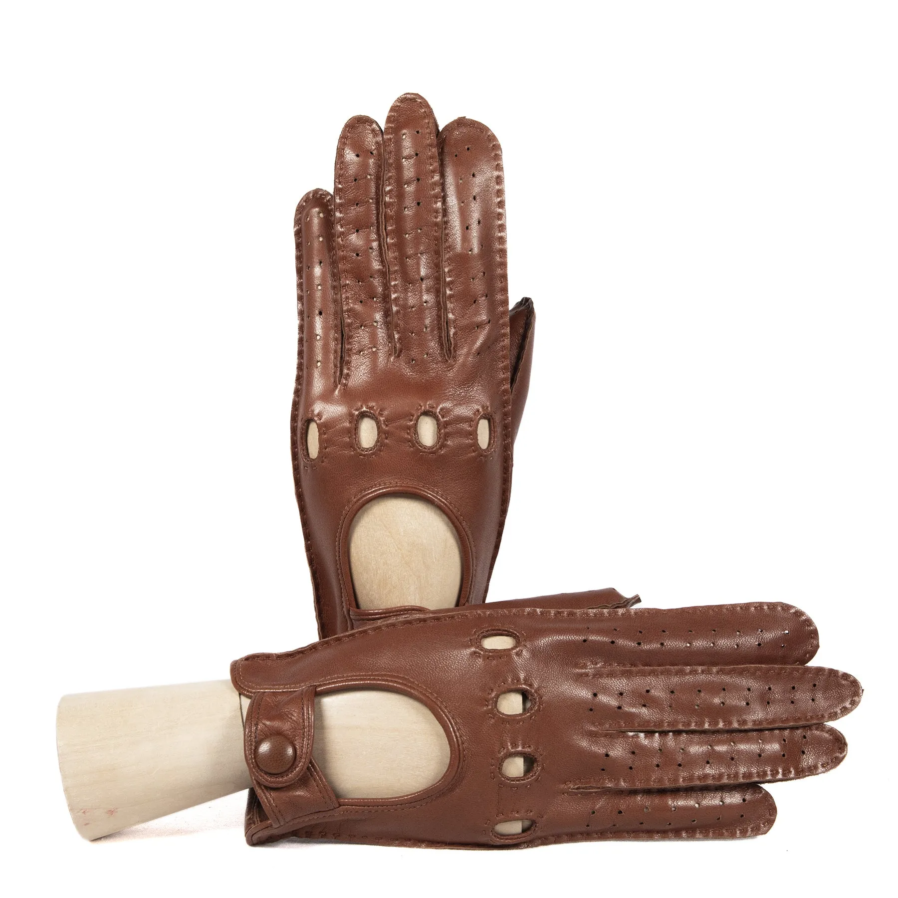 Women's unlined cognac leather gloves entirely hand-sewn with button closure